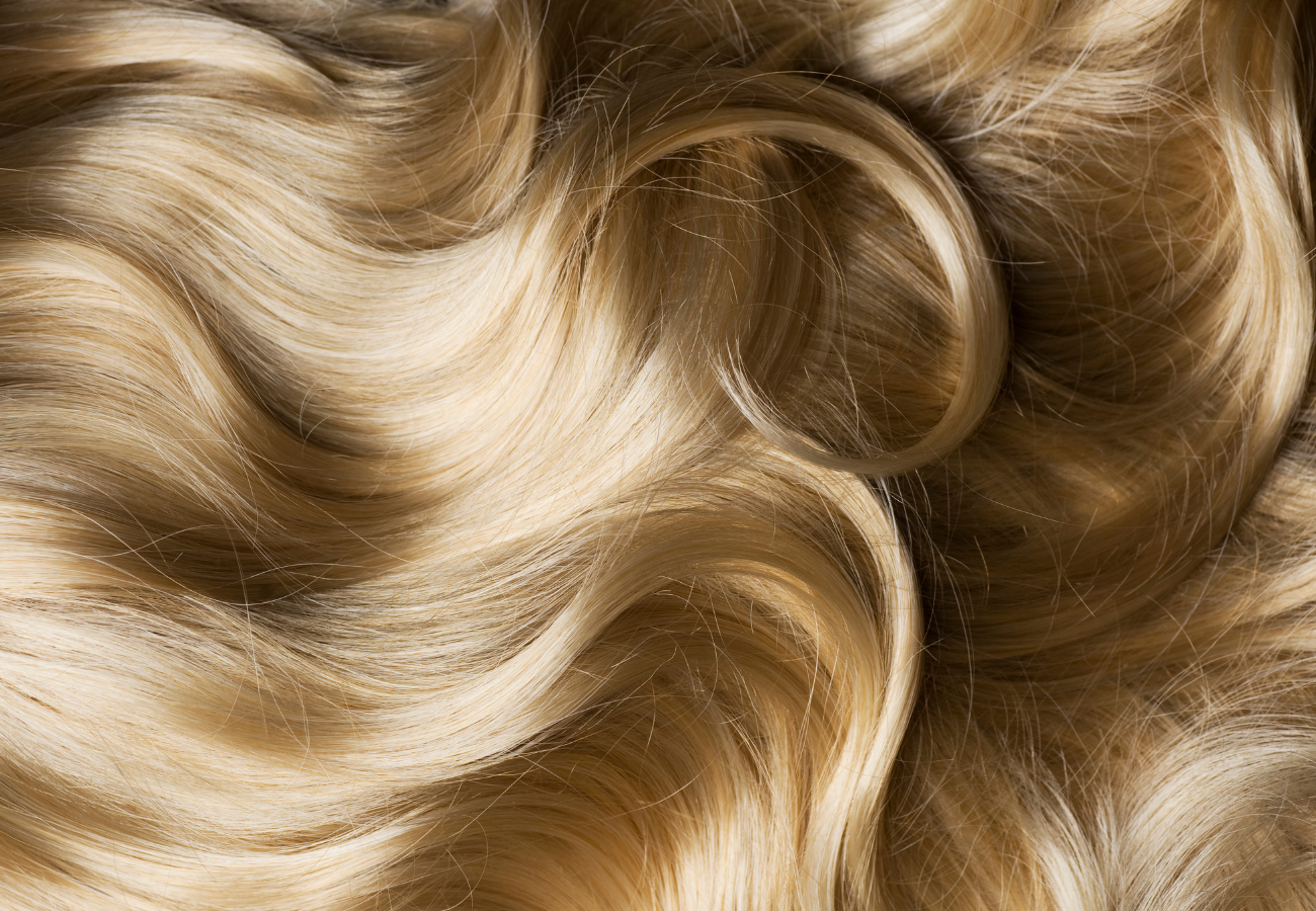 Image of long, wavy blonde hair on Eldorado's website