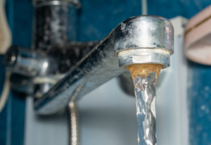 Image of a tap with hard water