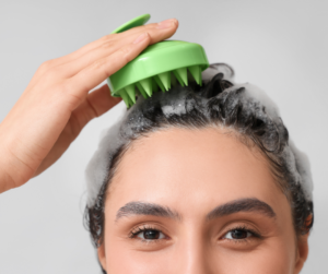 Image of a woman cleaning her scalp and hair