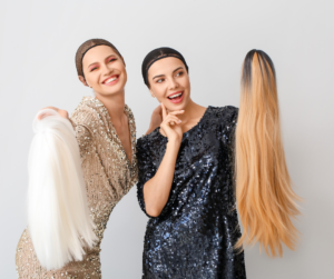 Image of two women with wigs